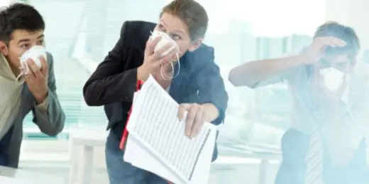 employees in an emergency drill to practice office safety