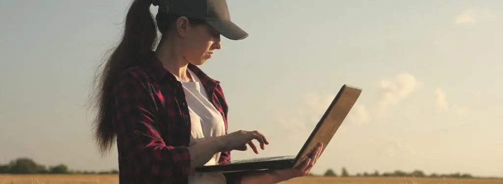 Employee using an environmental monitoring software to ensure safety.