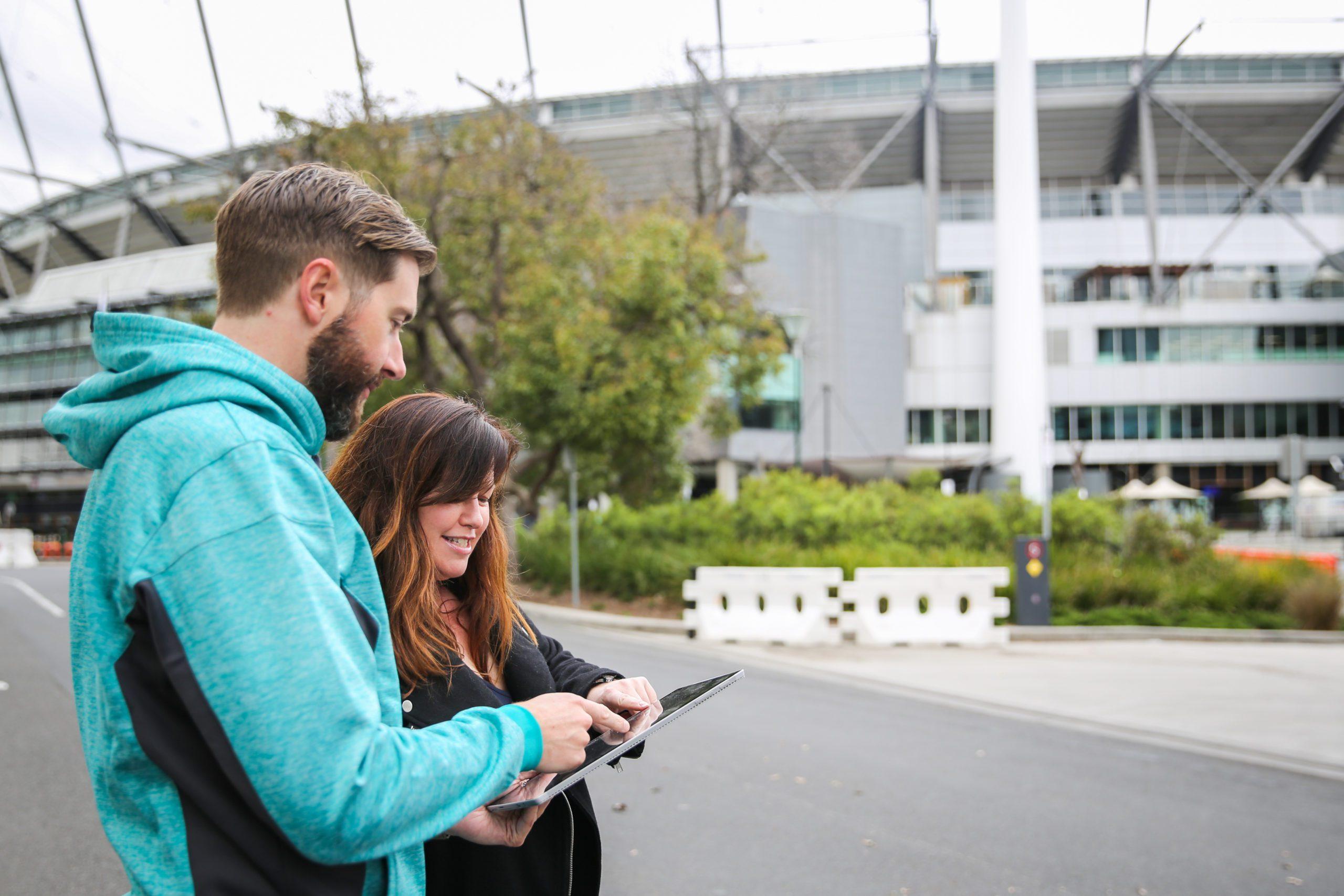 Ash & Carissa on SafetyCulture platfom outside the MCG