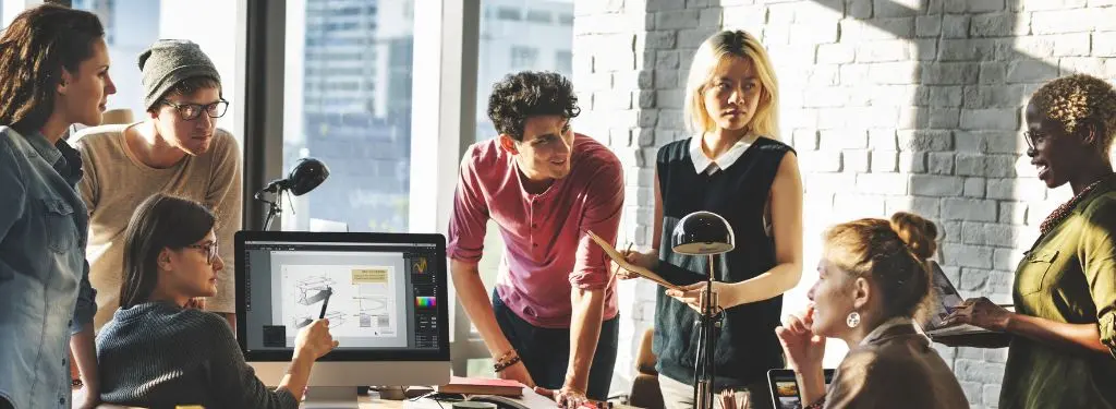 a group of employees managing a project with the help of project portfolio management software on desktop