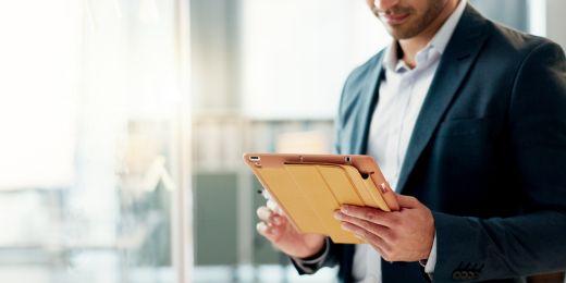 man creating logistics kpi on a tablet