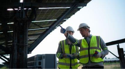 two workers conducting a field safety corrective action inspection