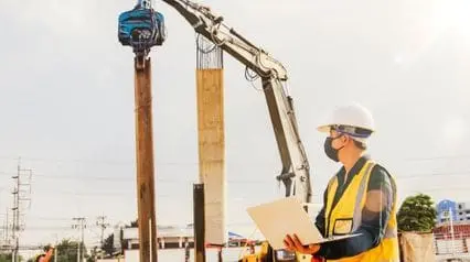 a construction project manager overseeing the project e