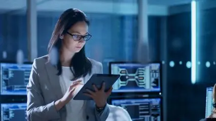 a cybersecurity professional conducting a cybersecurity governance audit with the help of a tablet device