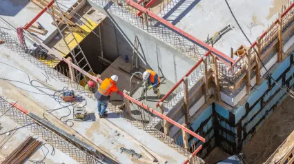 construction workers working on a project from top view